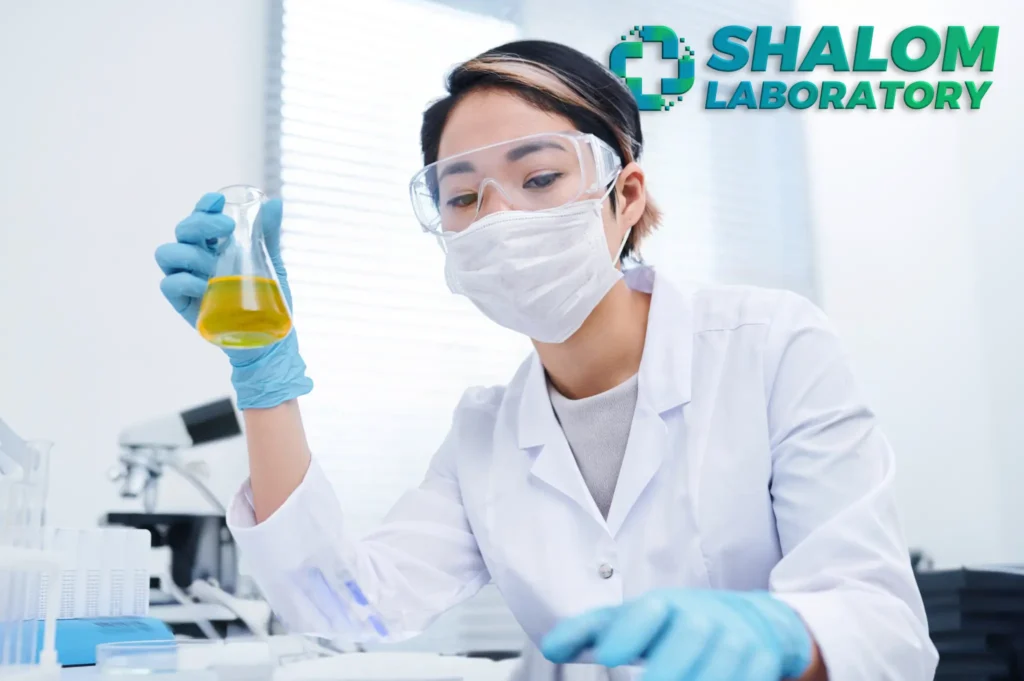 An employee working as Specimen Collector as a job in a medical laboratory.